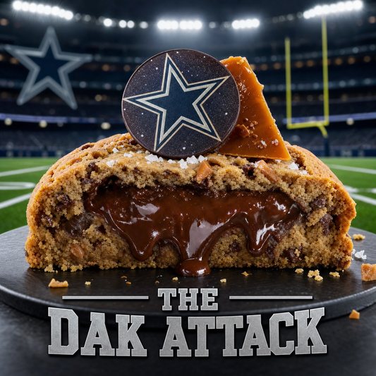Gourmet Dark Attack Cookie by Bella Dolce Bakery featuring rich chocolate and decadent toppings on a white plate.